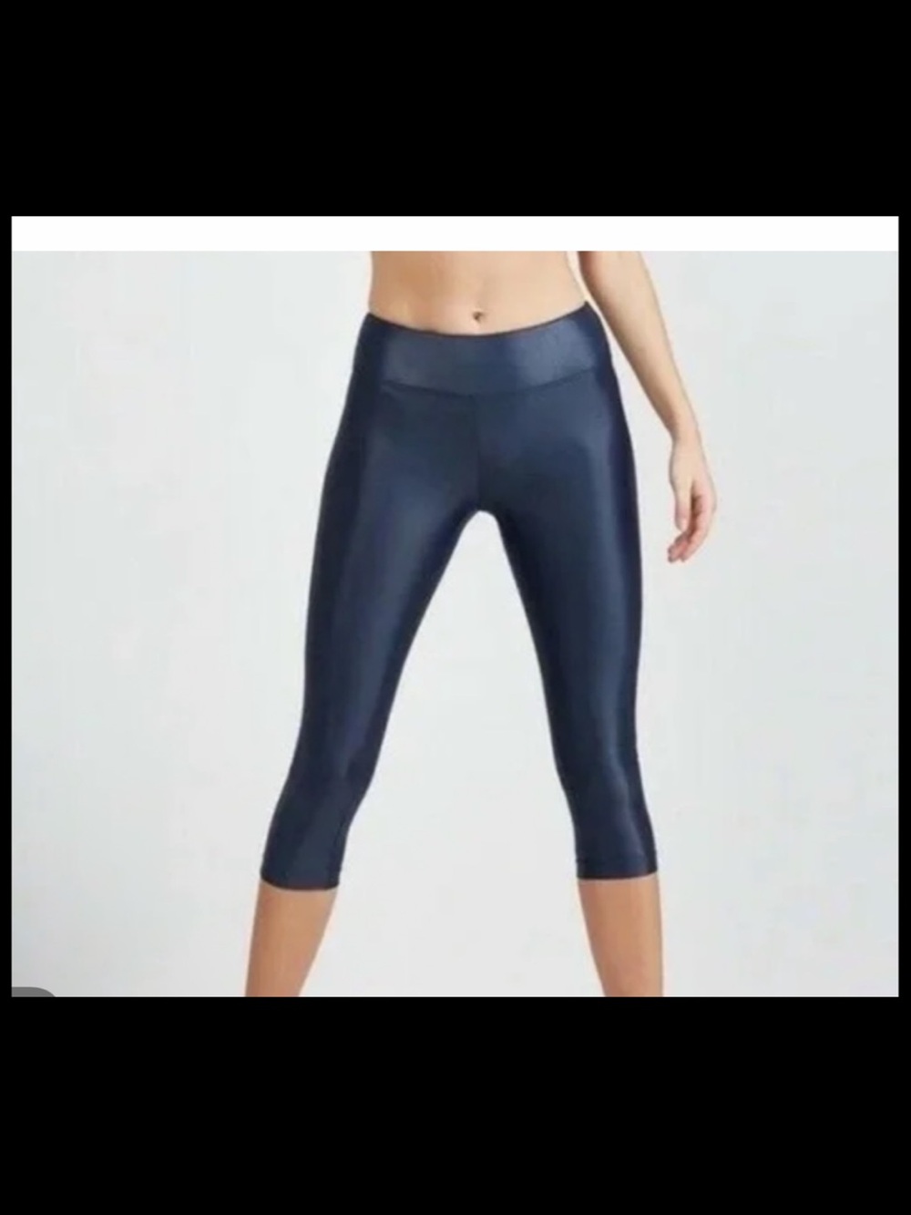 Koral Lustrous High-Rise Capri Leggings in Color Midnight Blue